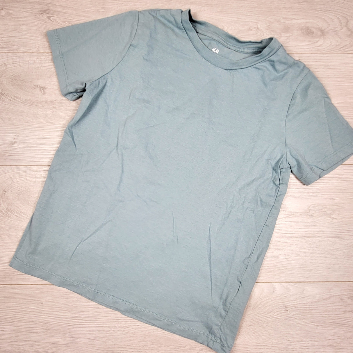 H and M blue-grey t-shirt. Size 8-10 Years
