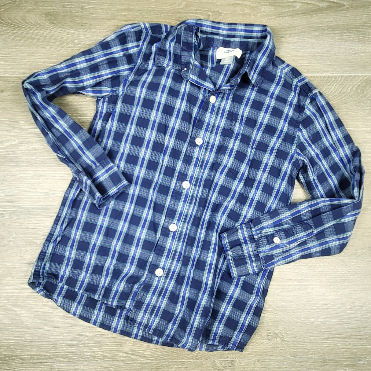 Old Navy blue plaid long sleeve button down shirt. Size 6/7