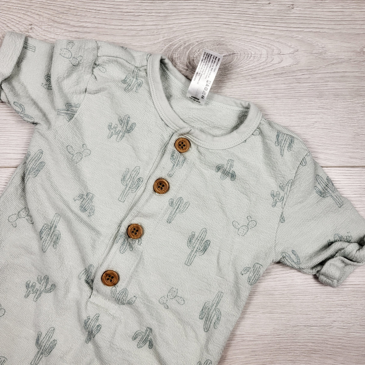 Modern Moments pale green cactus print romper. Size 24 months
