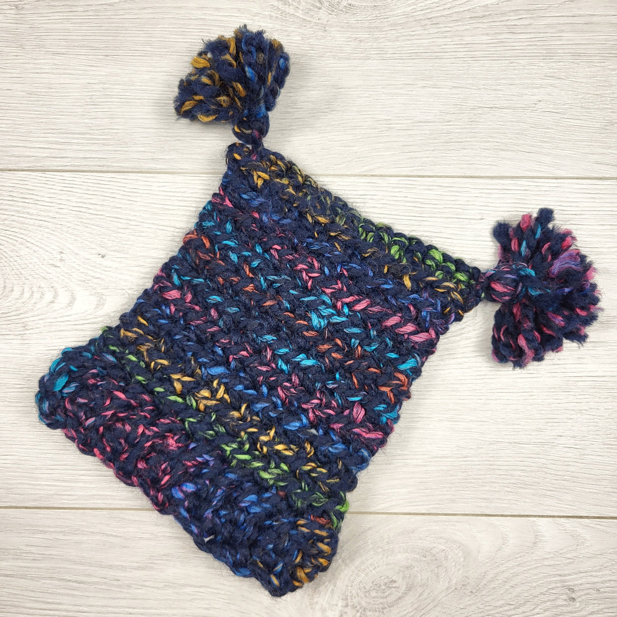 Handmade navy double pom pom toque. Approx 6-12 months