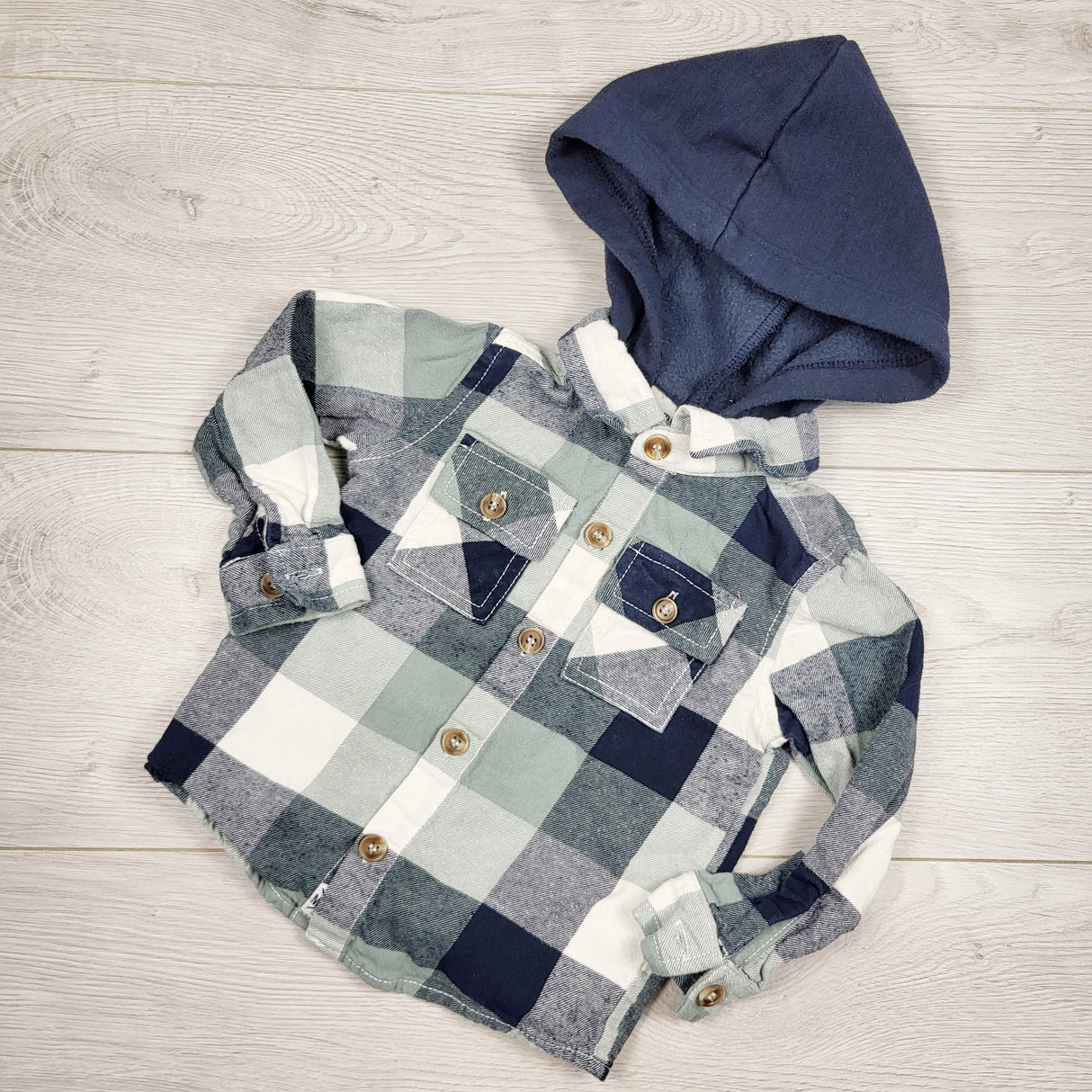 Mid hooded plaid button down flannel shirt. Size 9-12 months