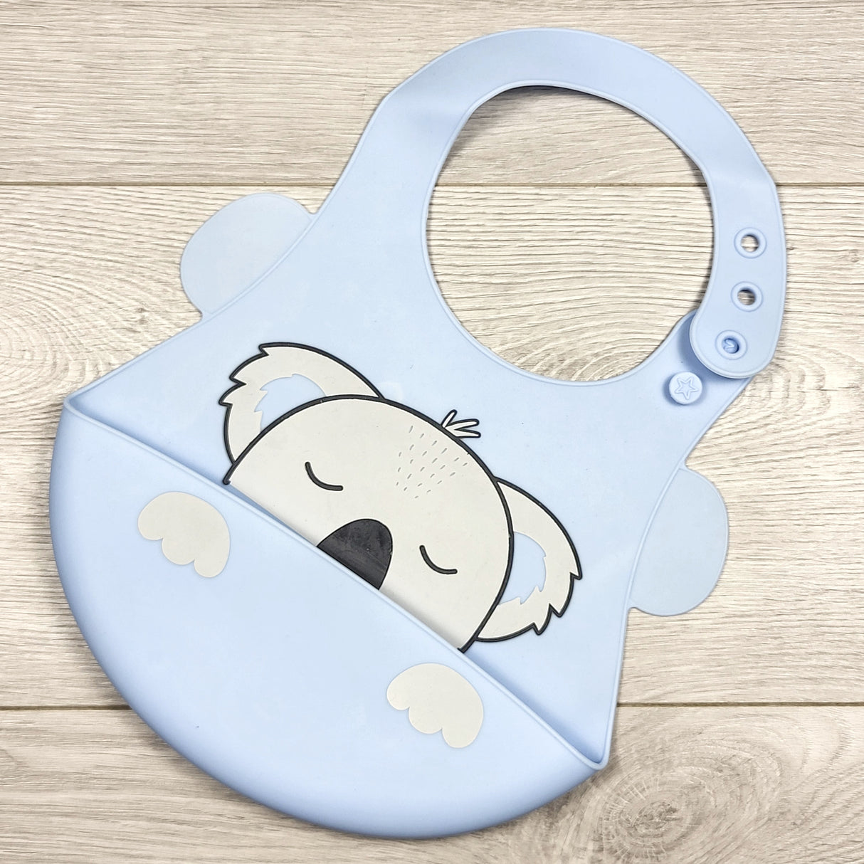 Blue silicone bib with koala