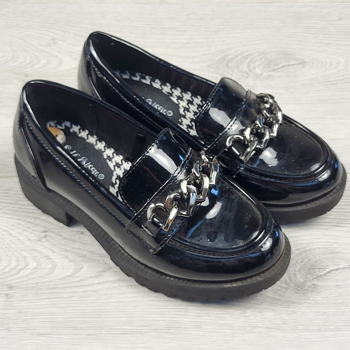 Self Esteem black patent leather penny loafers. Size 12