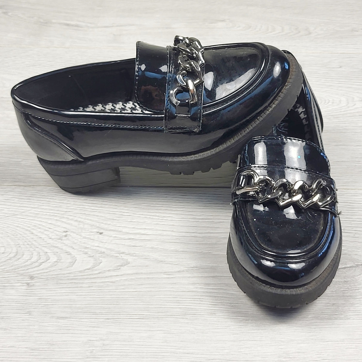 Self Esteem black patent leather penny loafers. Size 12