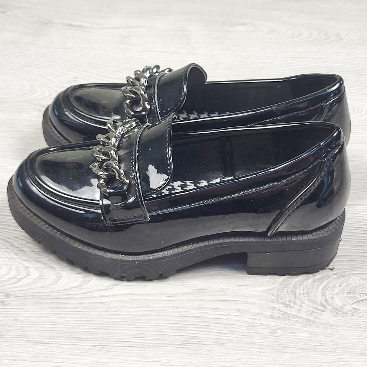 Self Esteem black patent leather penny loafers. Size 12