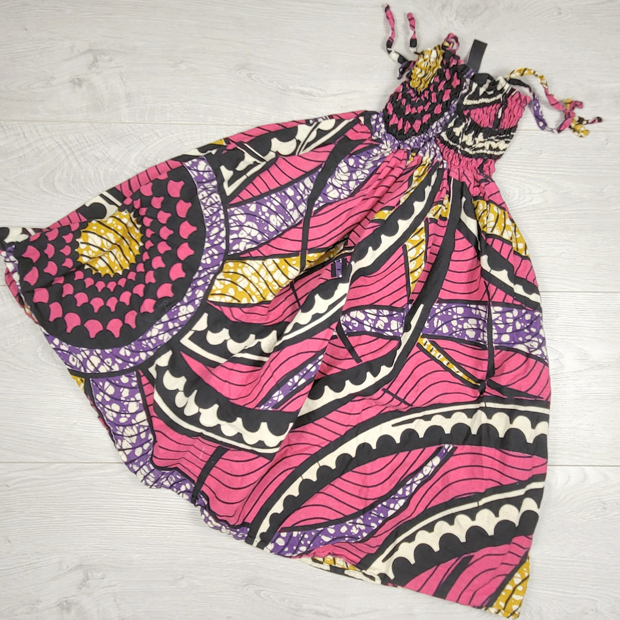 Zakile pink patterned smocked sleeveless dress. Size 4-7 Years