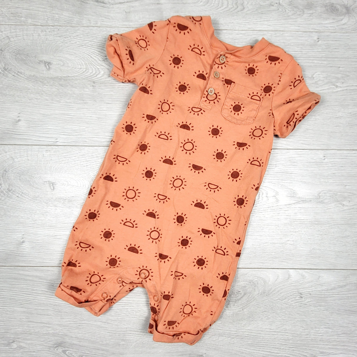 Joe orange cotton romper with suns. Size 12-18 months