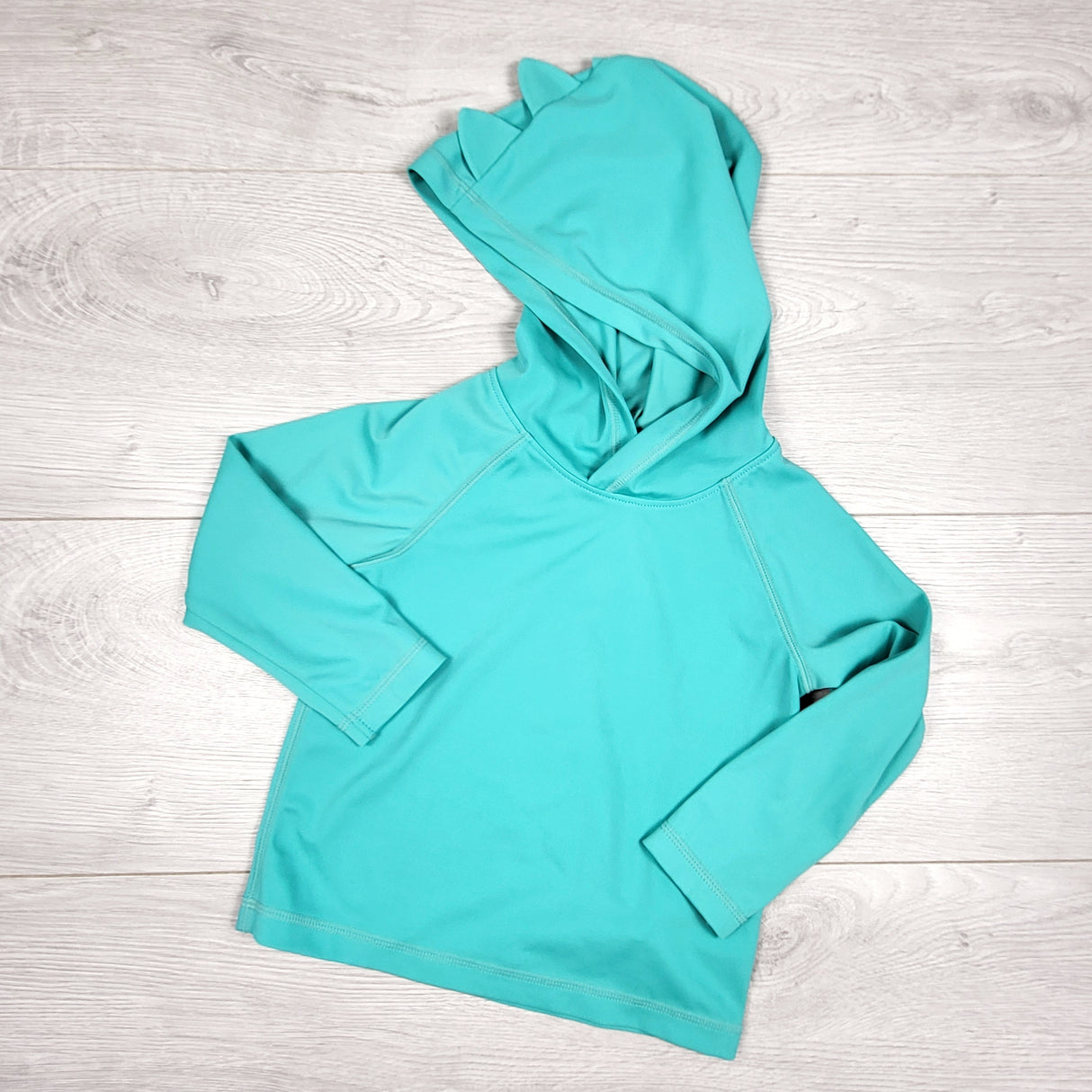 Old Navy turquoise hooded rash guard. Size 18-24 months
