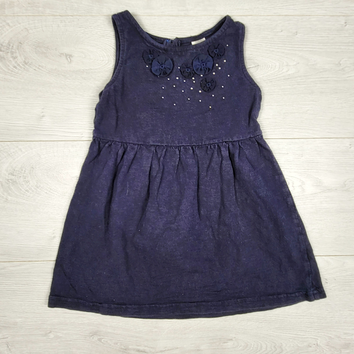 Oshkosh navy dress with fabric flowers. Size 3T