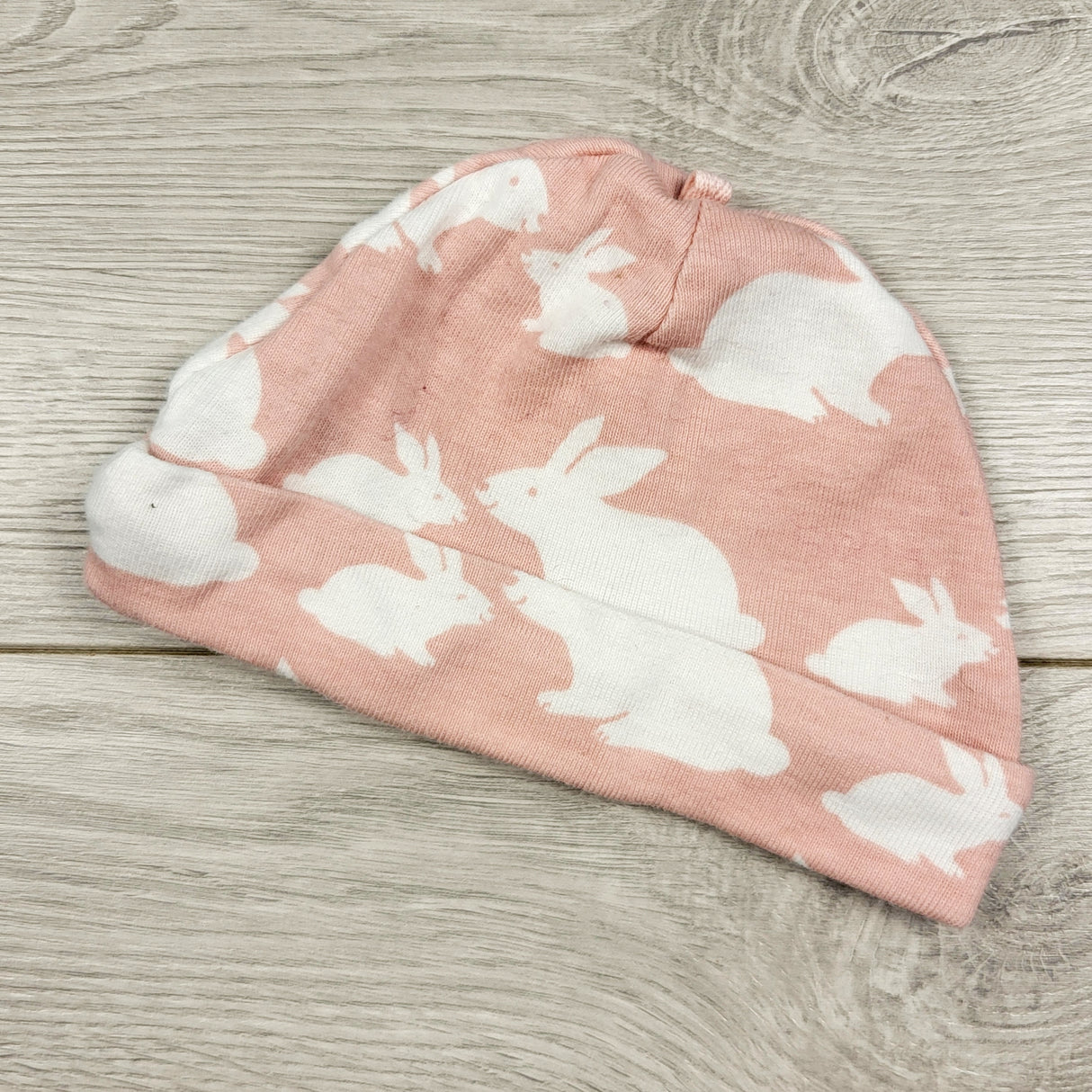 Carters pink baby hat with bunnies. Newborn size