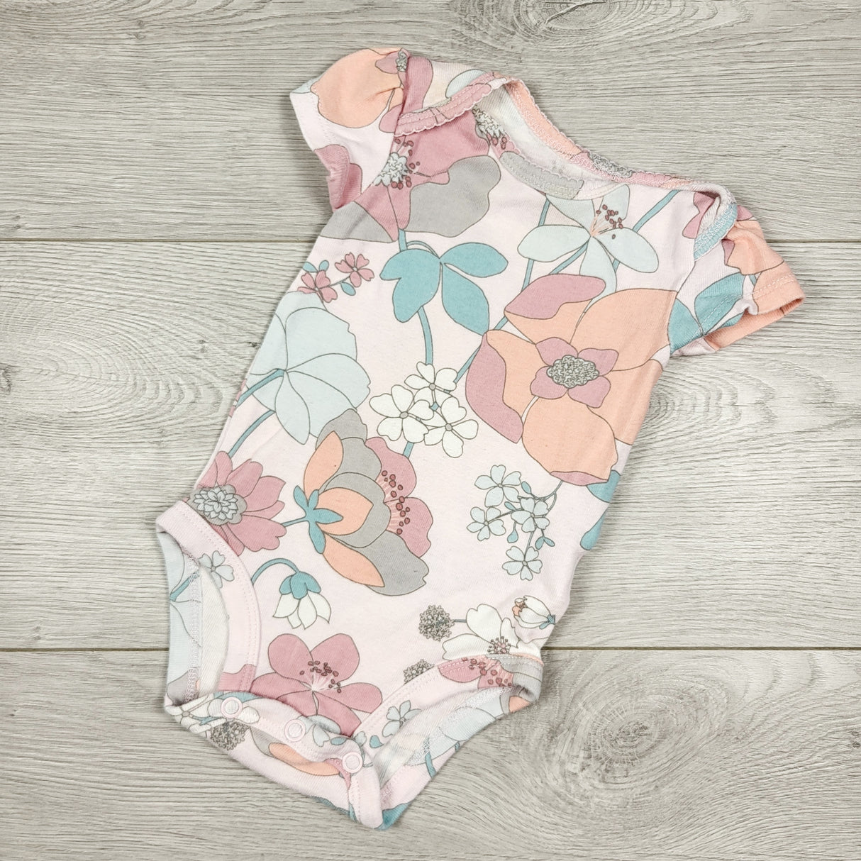 Carters pink floral print bodysuit. Size 3 months