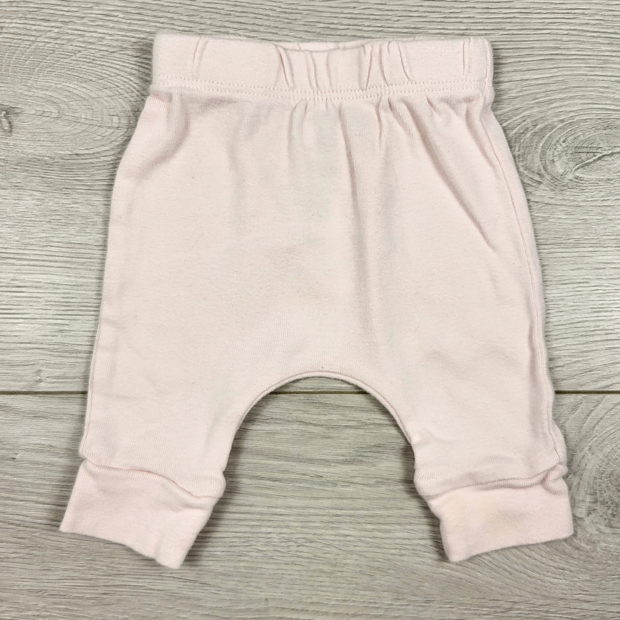 Carters pale pink cotton pants. Newborn size