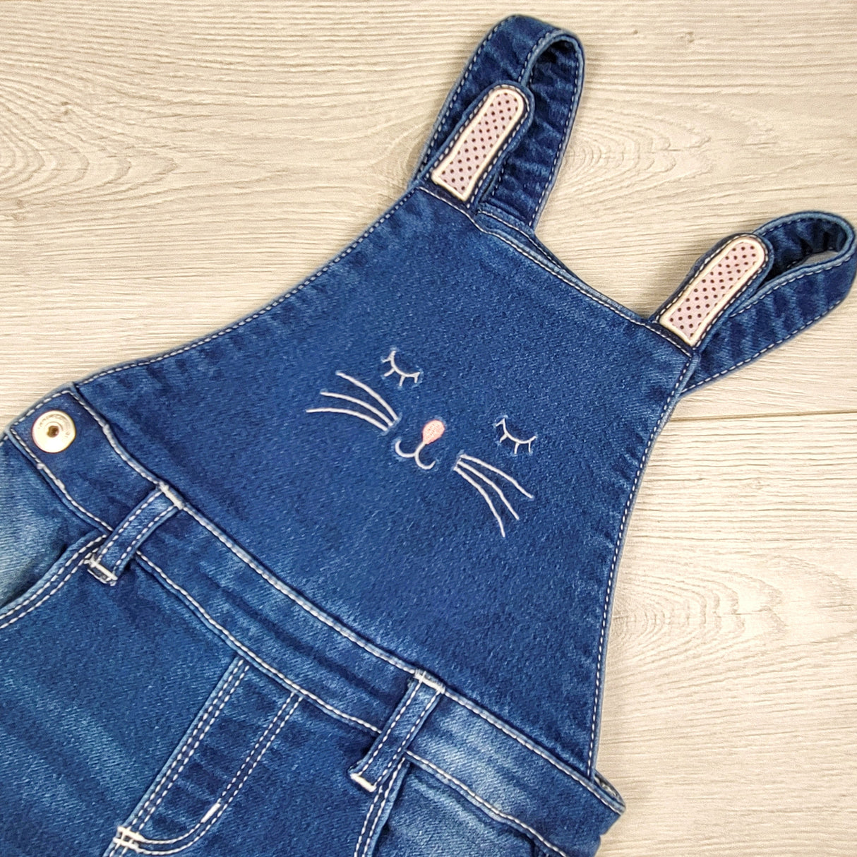 Baby Girl brand denim overalls with bunny face. Size 12-18 months