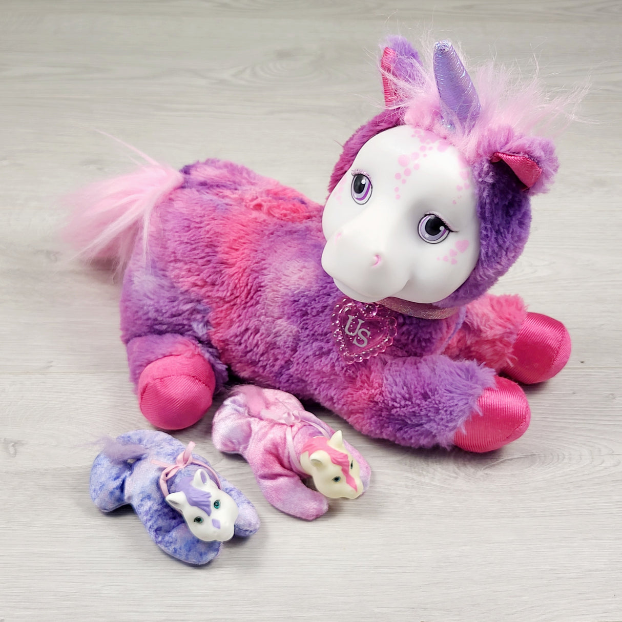 Just Play Unicorn Surprise Livia plush toy with 2 babies