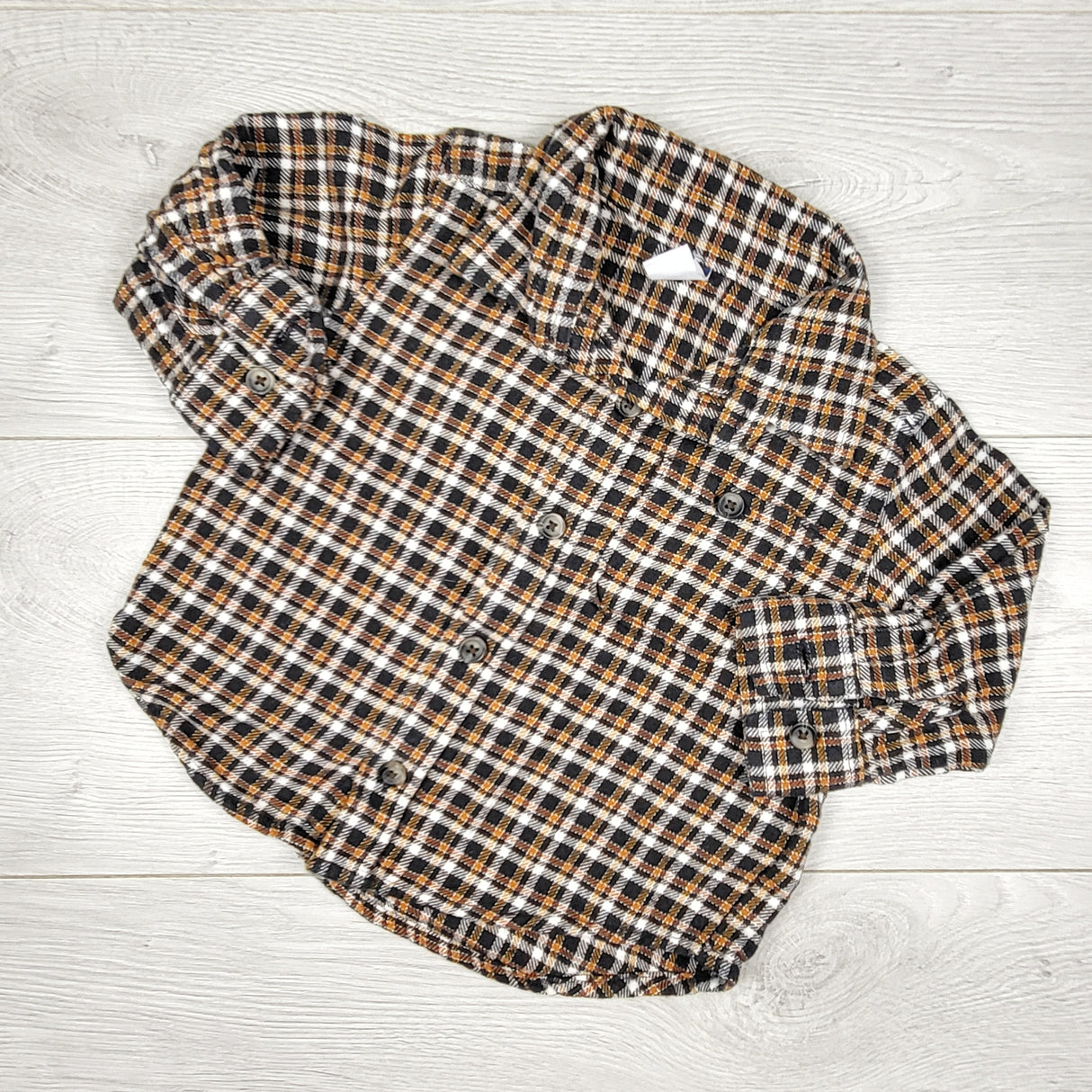 Old Navy plaid button down flannel shirt. Size 12-18 months