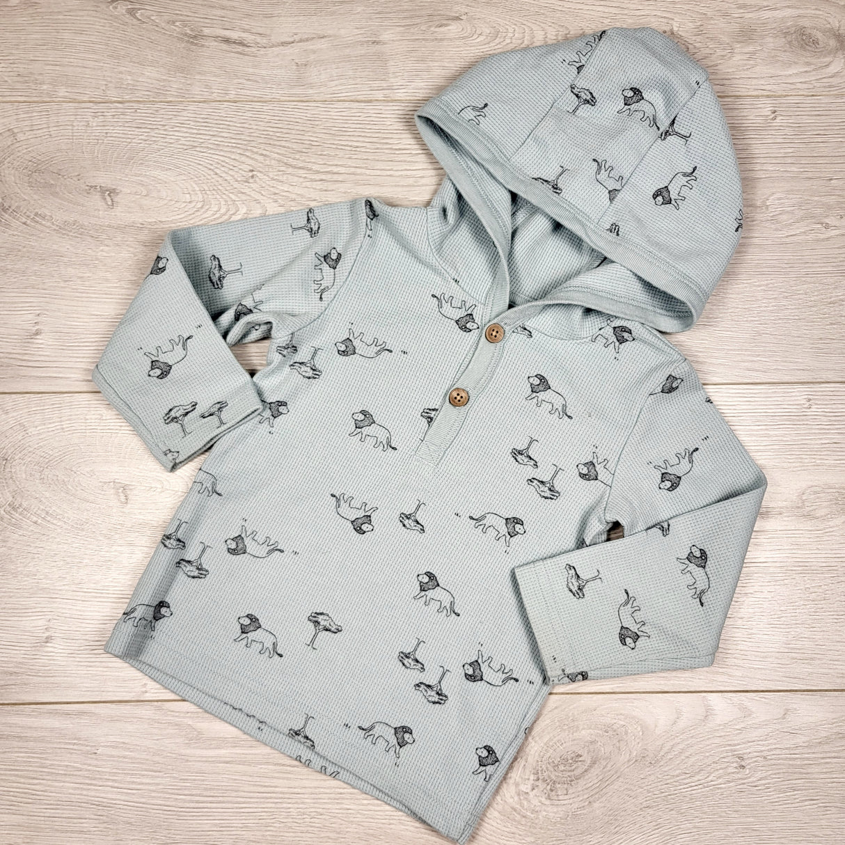 Child of Mine light blue hooded waffle knit shirt with lions. Size 18 months