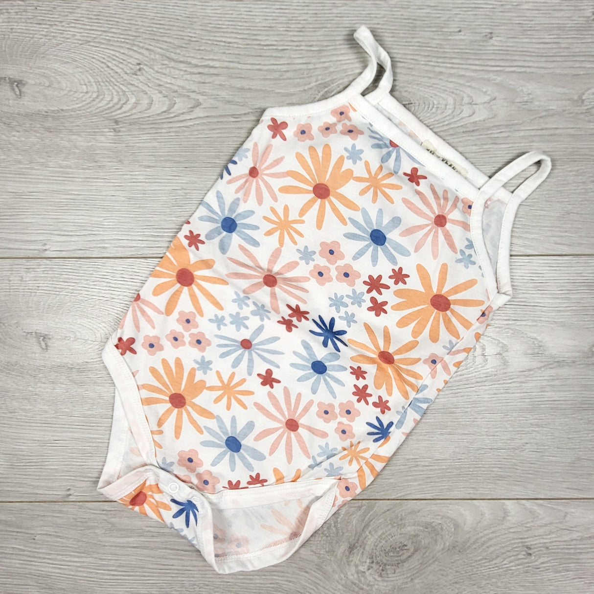 Kit and Pearl white floral print tank style bodysuit. Size 18 months