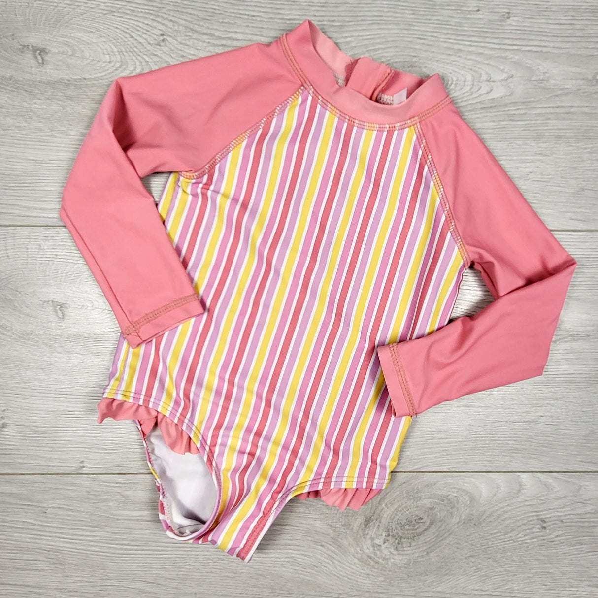 Joe Fresh pink striped long sleeve swimsuit. Size 12-18 months