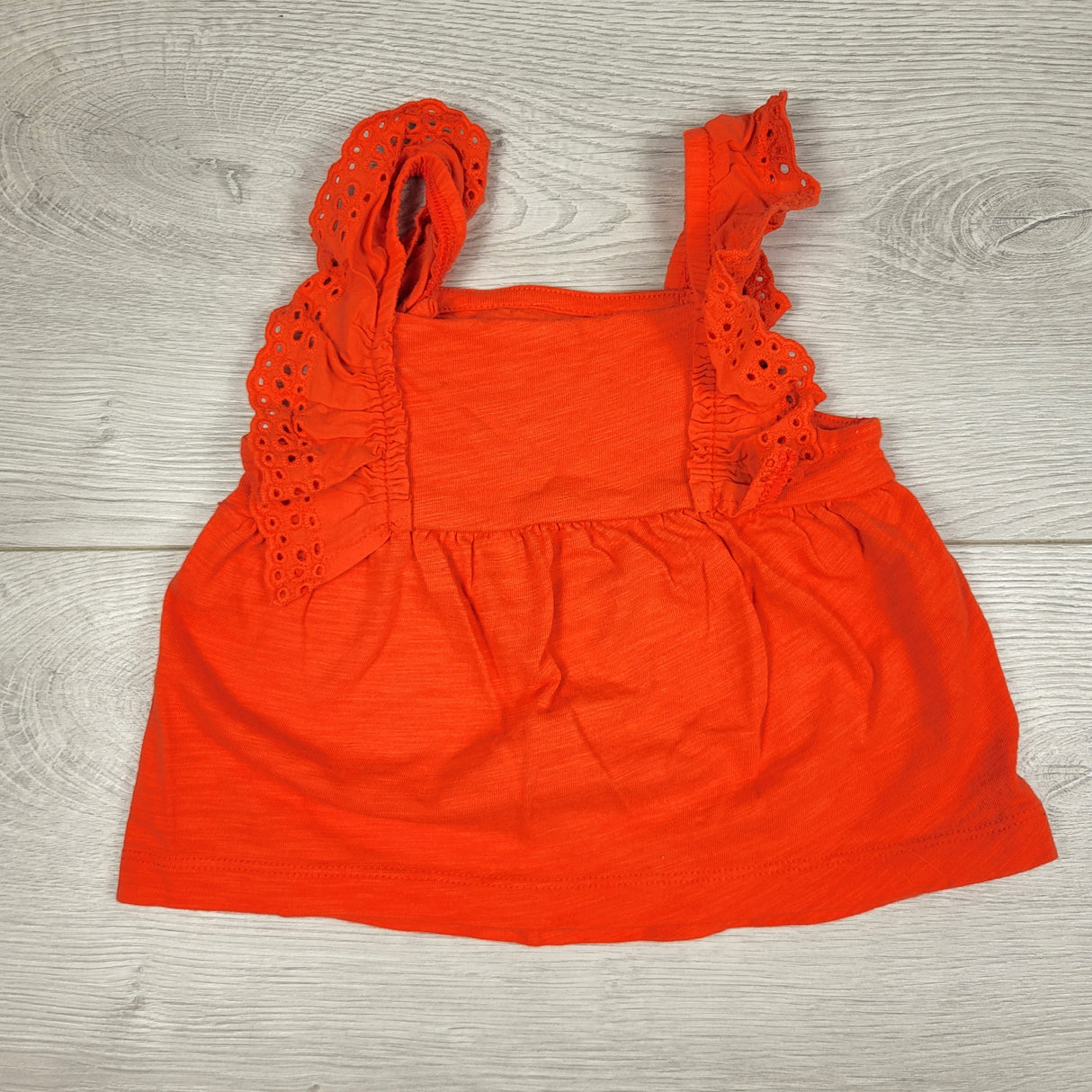 Carters reddish-orange eyelet ruffle top. Size 3 months