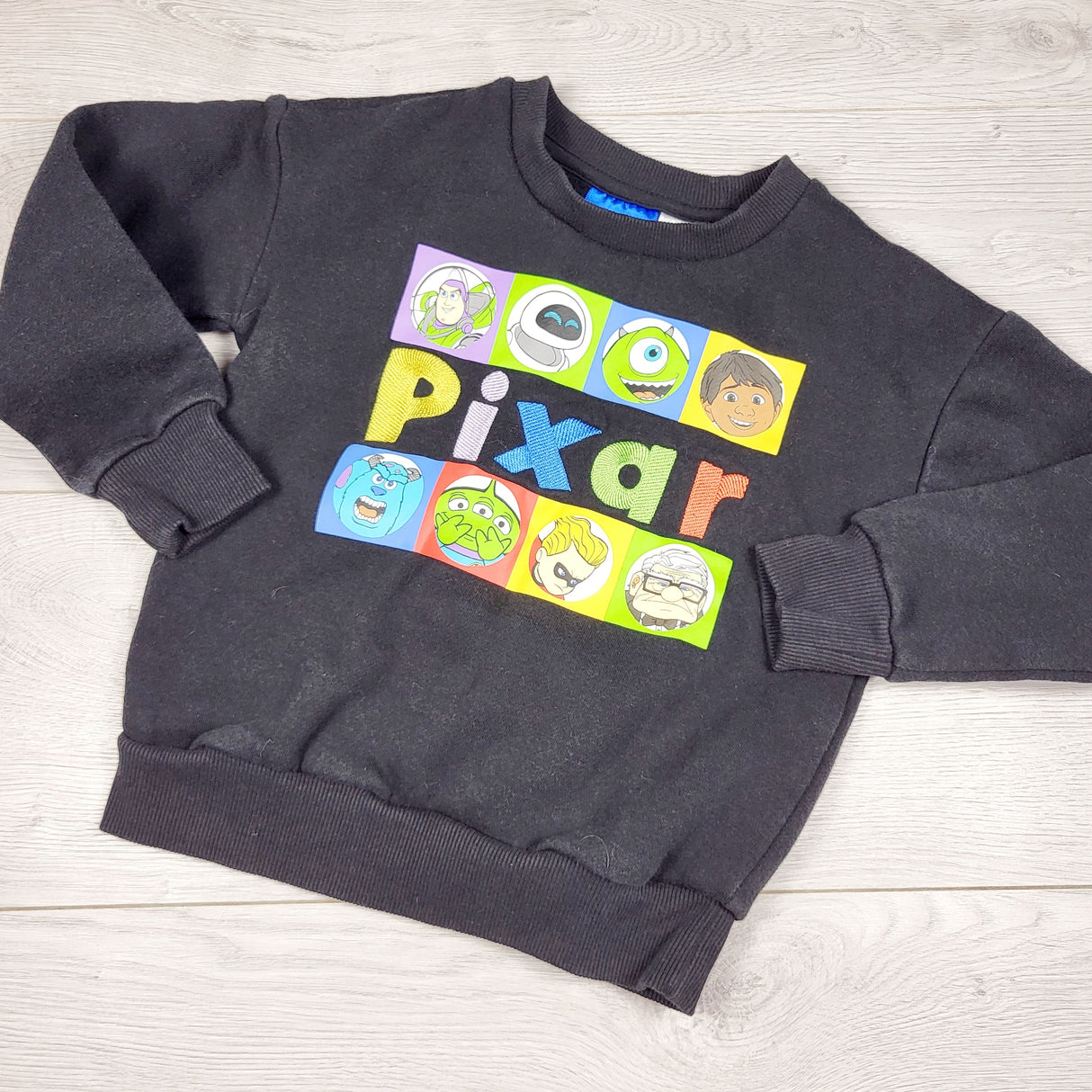Black Pixar sweatshirt. Size 4T