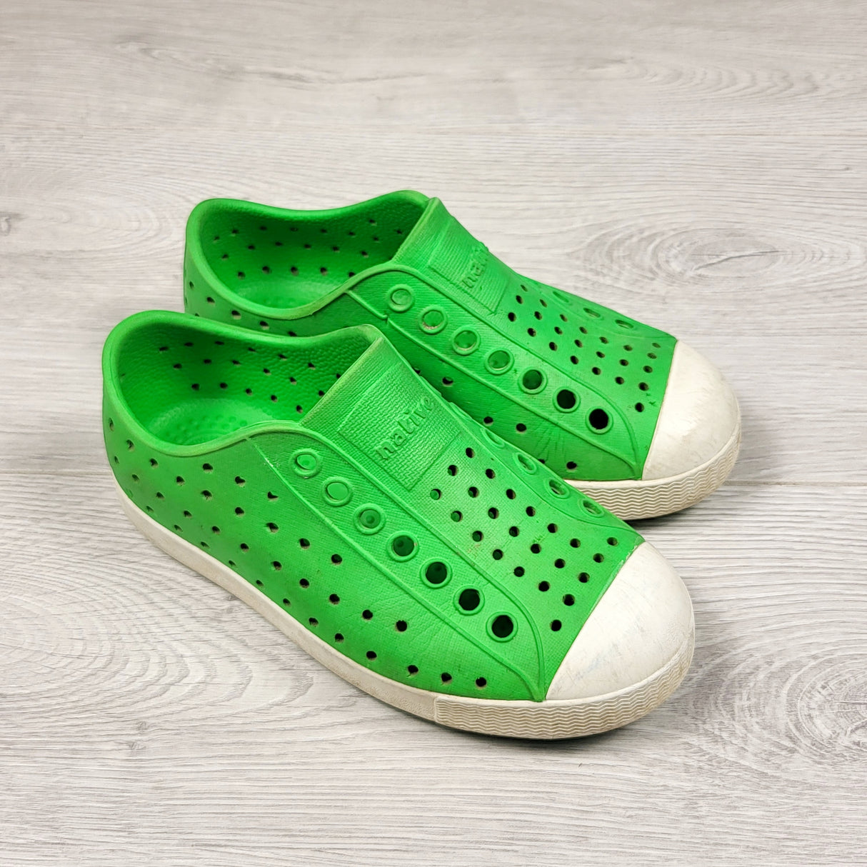 Native brand green rubber shoes. Size 10