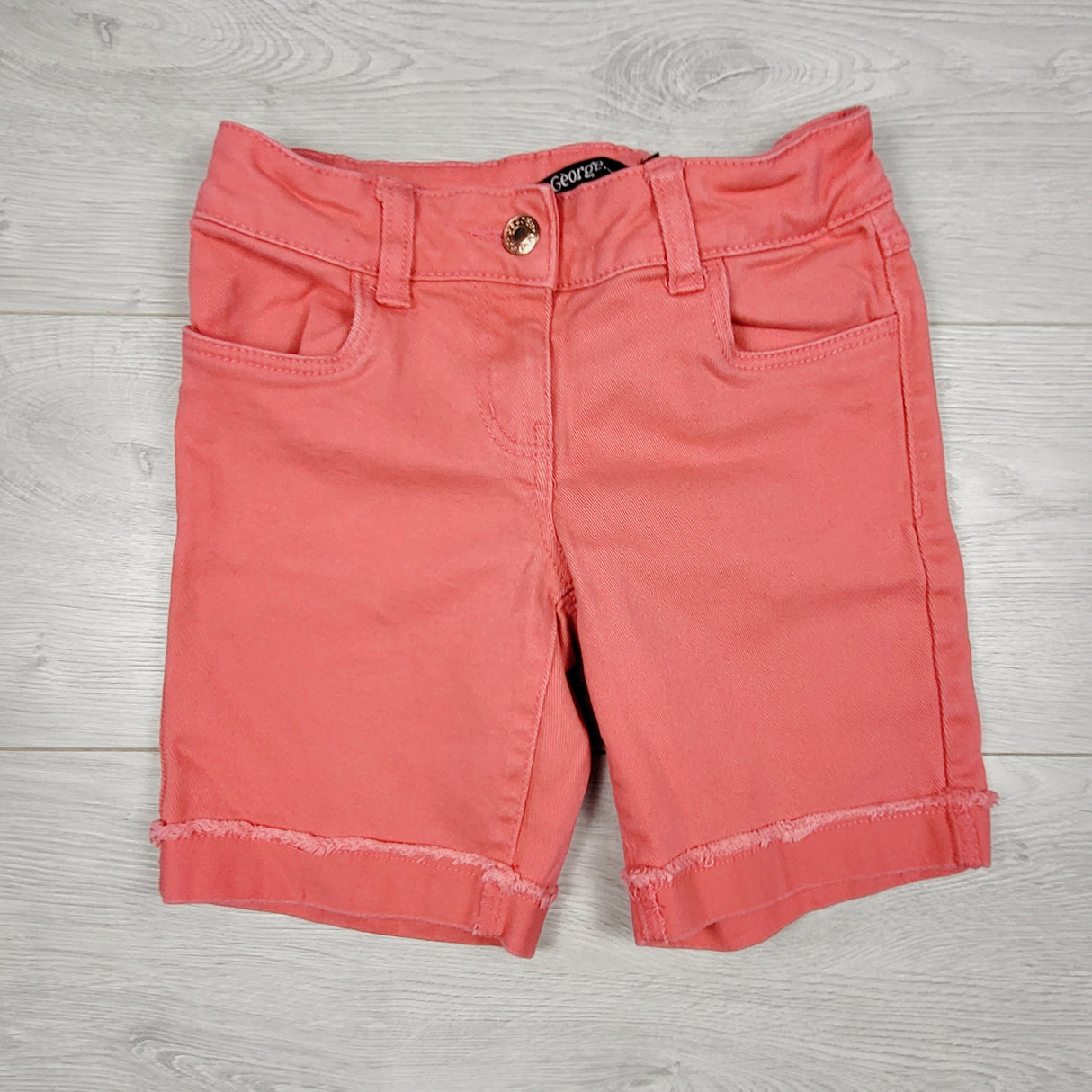George pinky-coral denim cuffs. Size 8