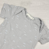 Basics by Mother's Promise grey and blue patterned romper. Size 12-18 months