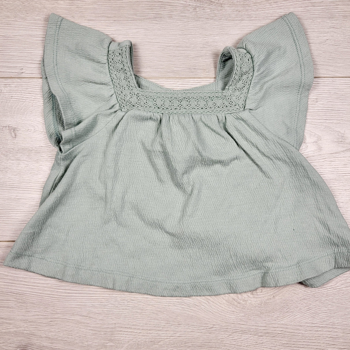 Carters aqua coloured top. Size 24 months