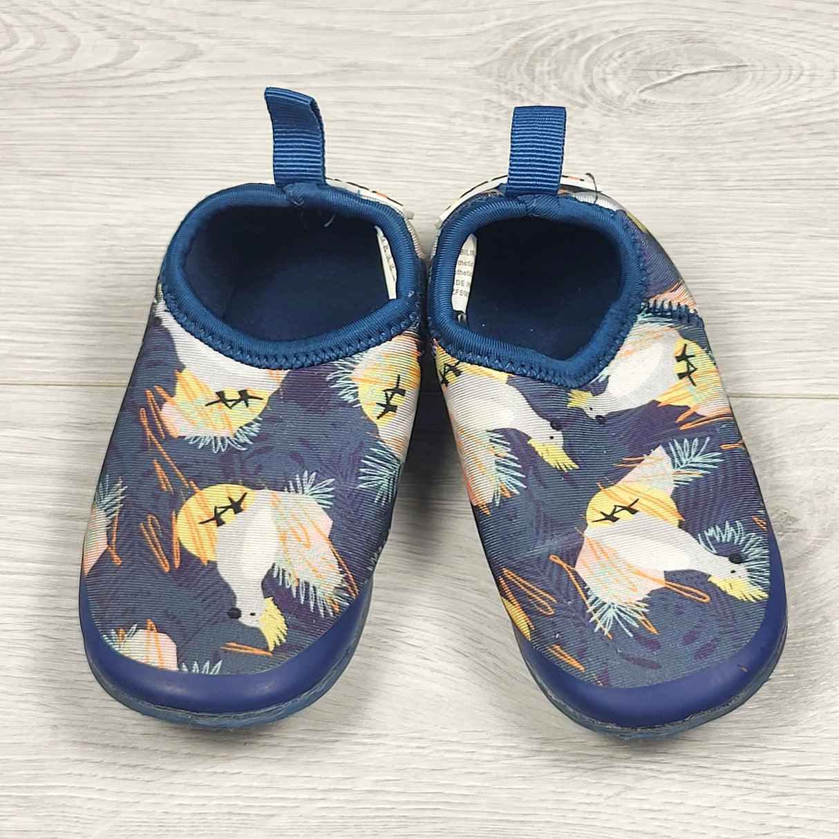 Minnow navy neoprene aqua shoes with cockatoos. Size 8