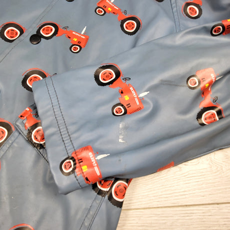 Hatley blue terrycloth lined rain coat with tractors. Size 6