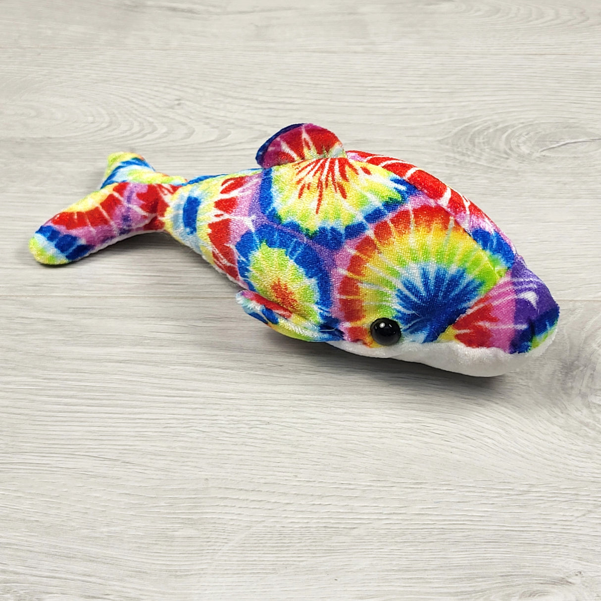 Tie dye plush dolphin