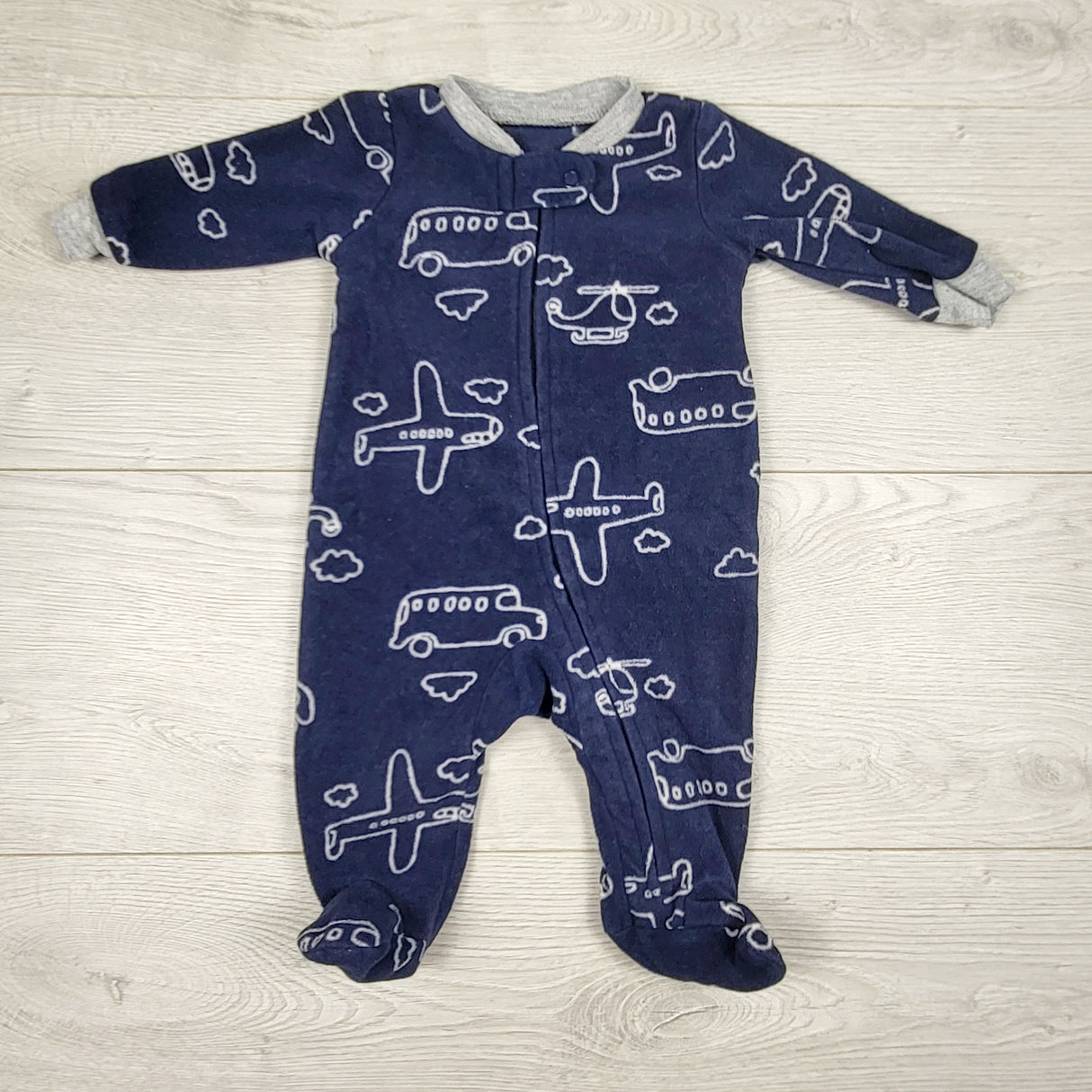 Carters navy zippered fleece sleeper with vehicles. Newborn size