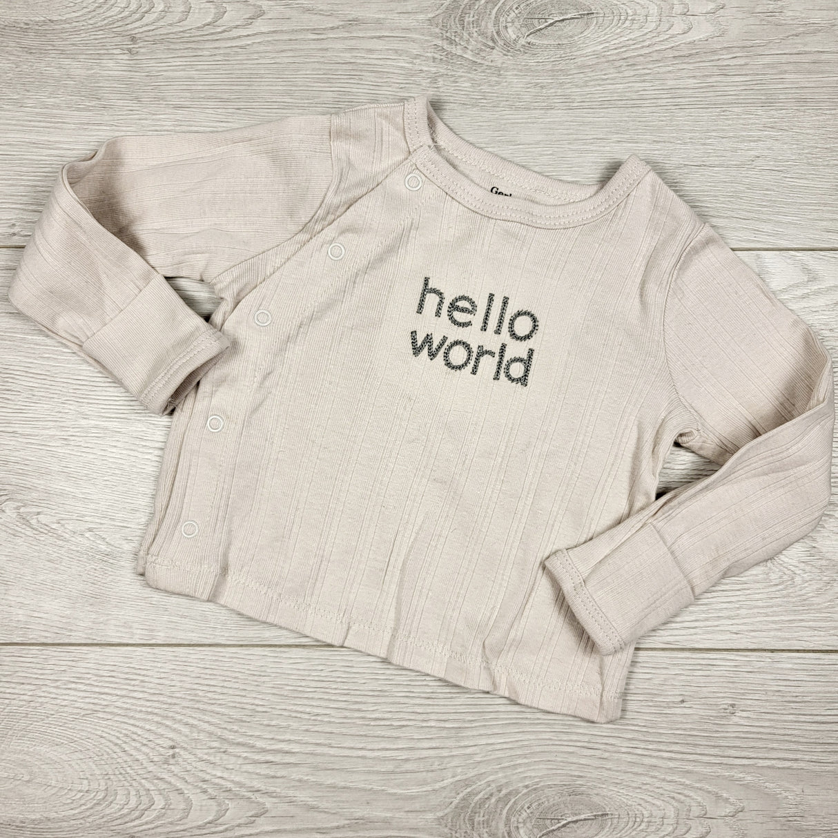 Gerber beige "Hello World" top. Size 0-3 months