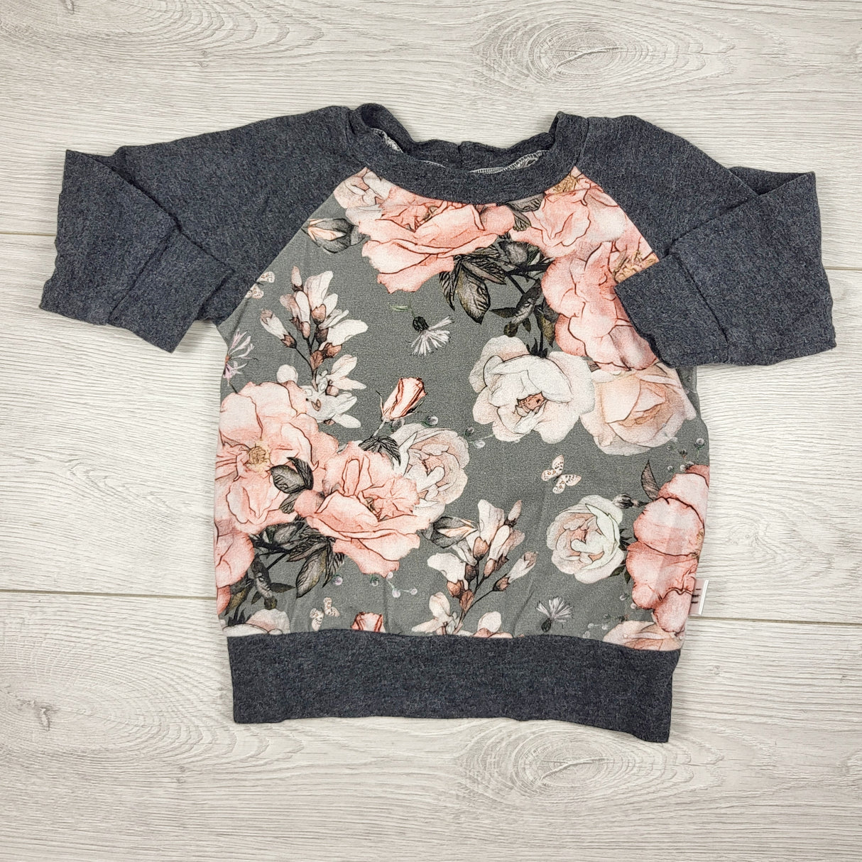 Grey floral print long sleeved top. Size 6-9 months