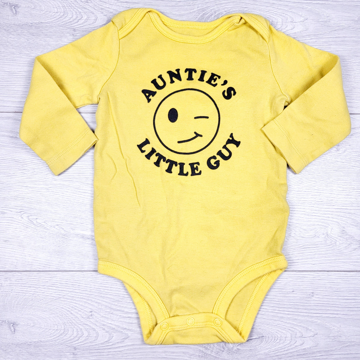 Carters yellow 'Auntie's Little Guy" bodysuit. Size 9 months
