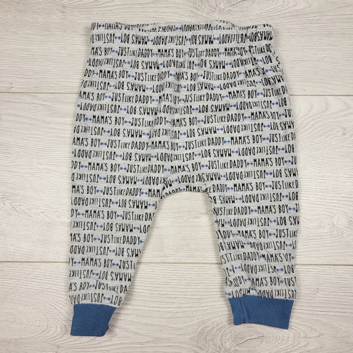 Grey cotton pants with writing. Size 6-9 months