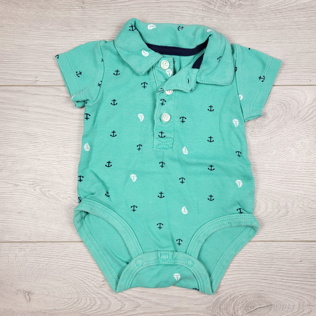 Carters turquoise collared bodysuit with anchors. Size 3 months