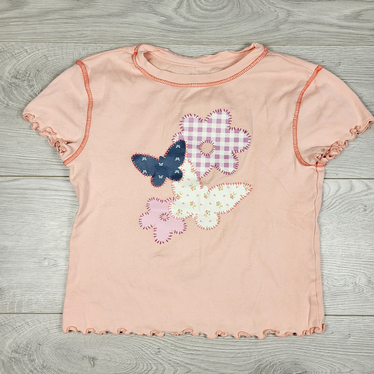 Old Navy pink cropped shirt with lettuce hem. Size 10/12