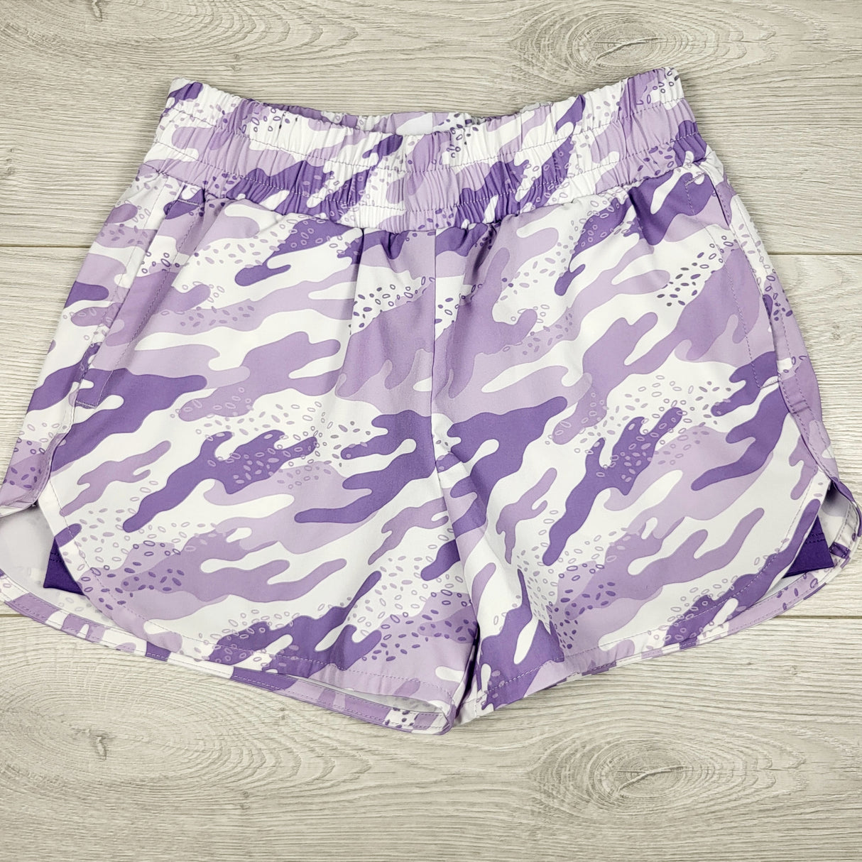 Bass Pro Shops purple camouflage running shorts. Size medium (8ish)