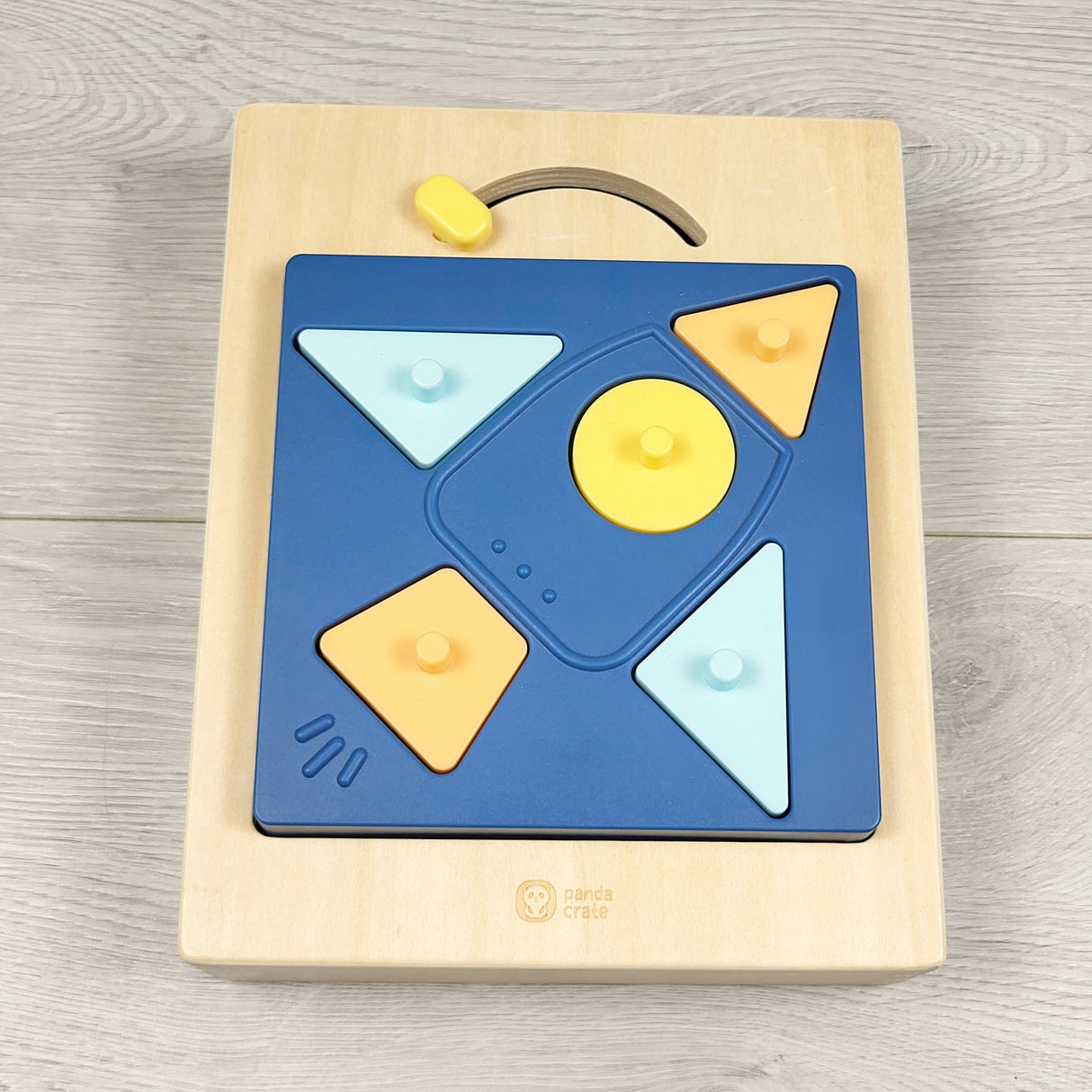 KiwiCo Panda Crate wooden shape-sorting puzzle