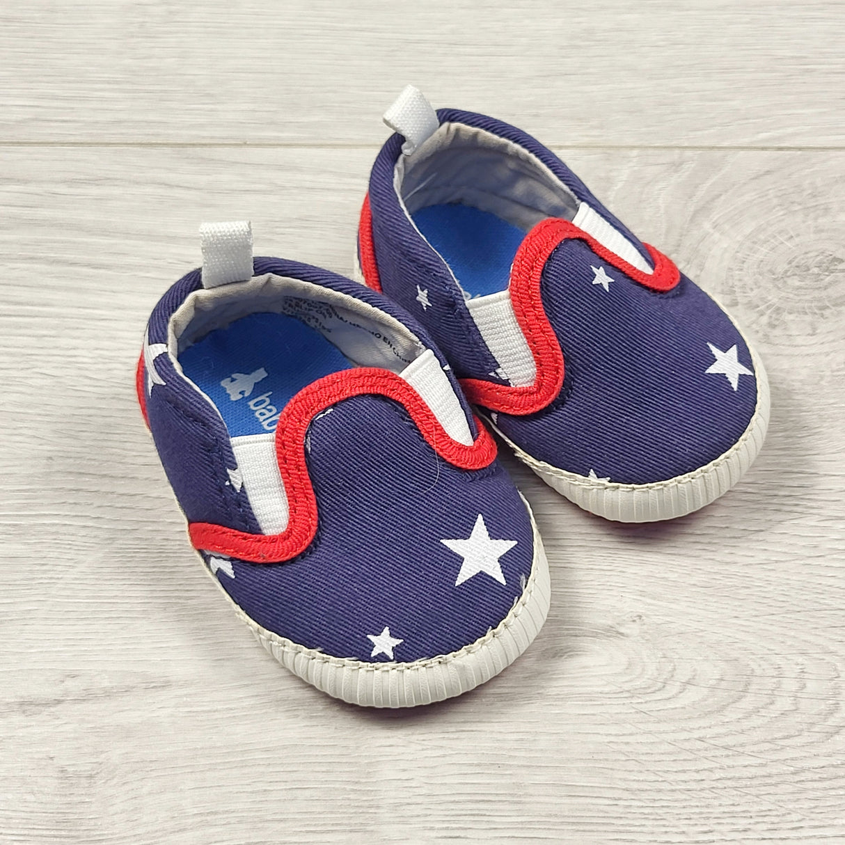 Gap navy soft soled canvas shoes with stars. Size 0-3 months