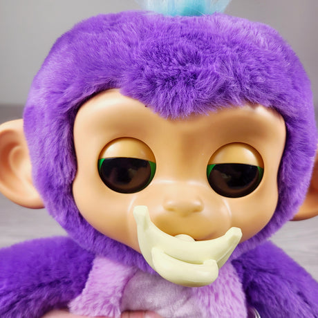 WowWee Fingerlings Care 'n' Cuddles interactive baby monkey plush toy