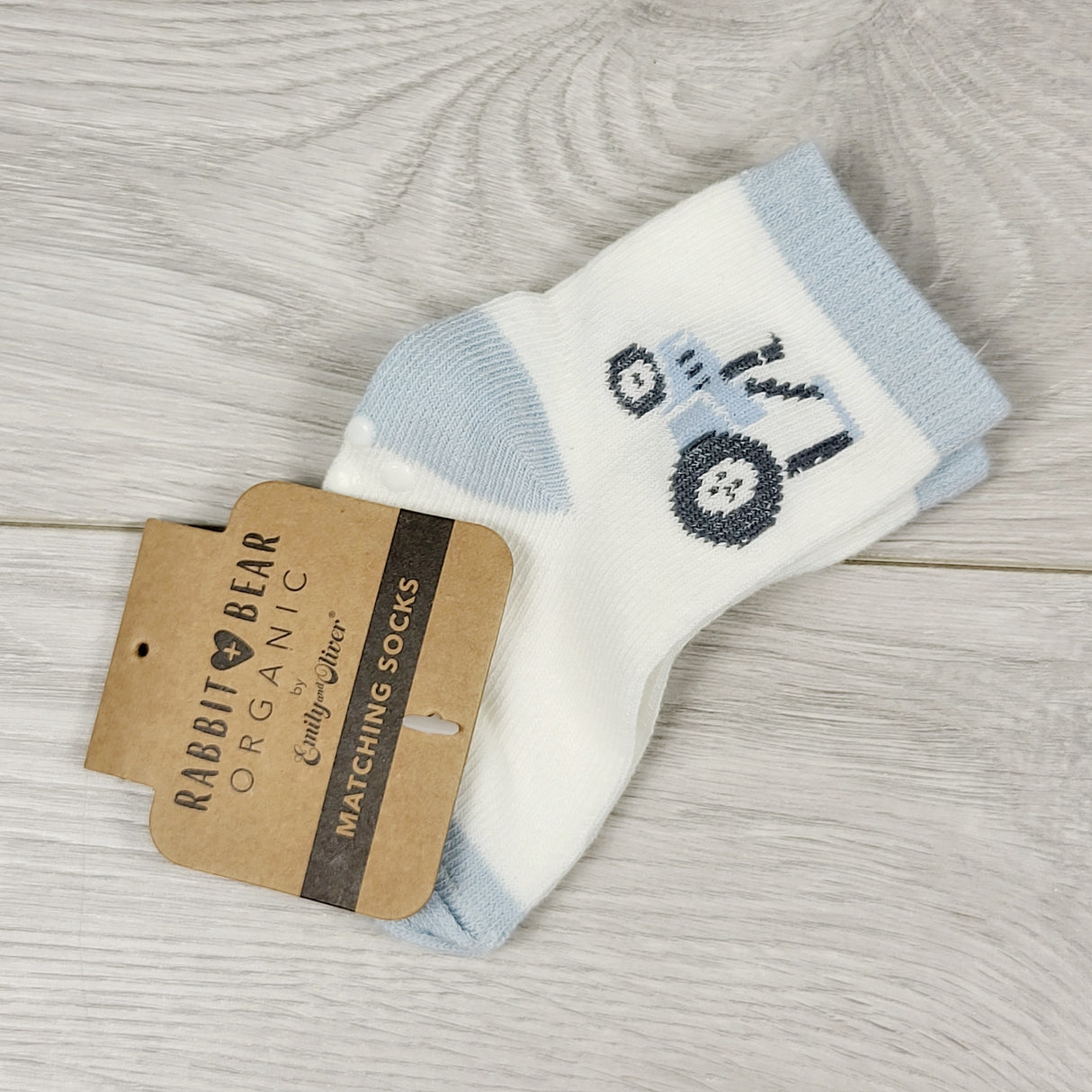 NEW - Rabbit + Bear socks with tractor. Sizes like 0-3 months