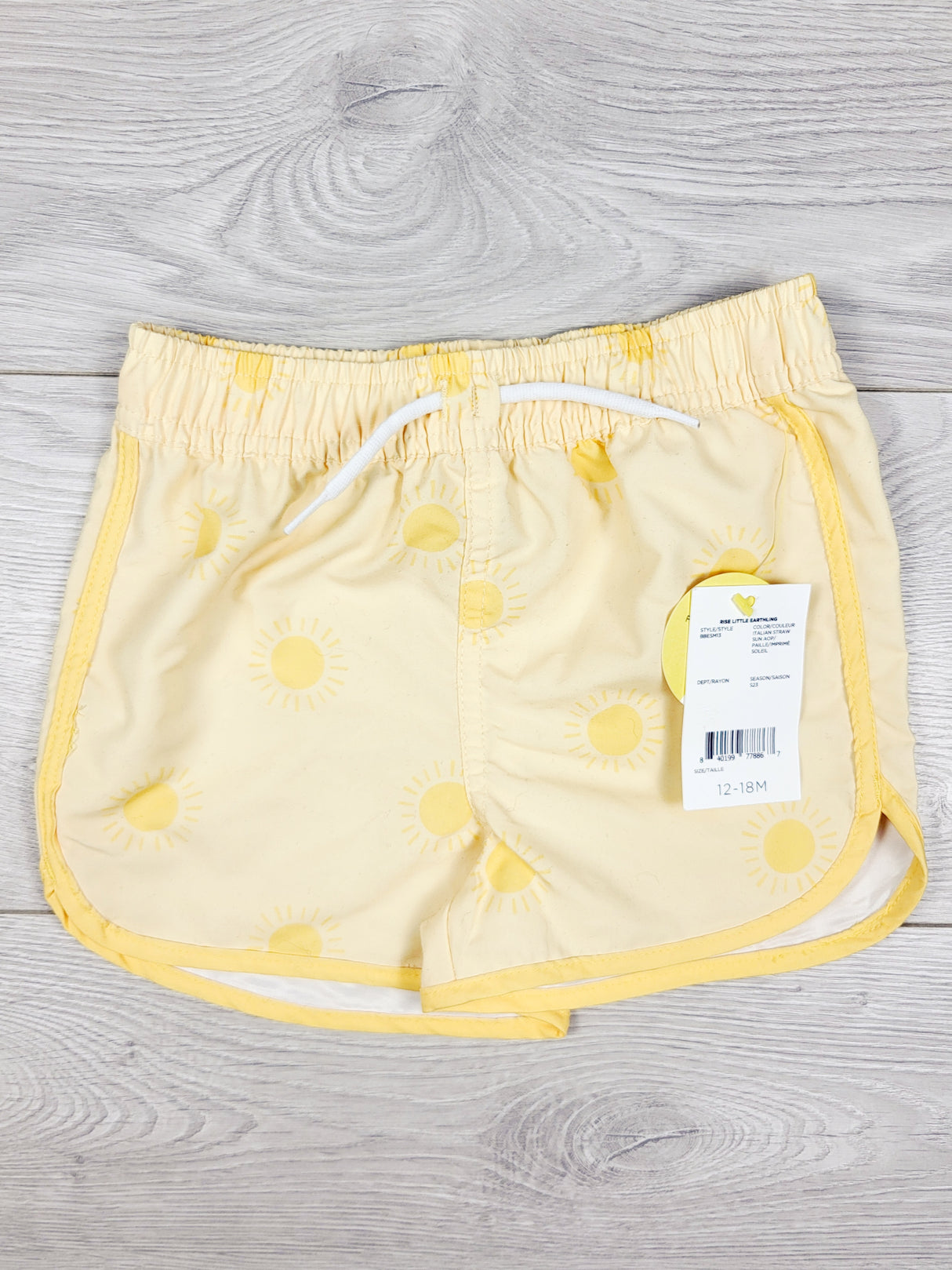 NEW - Rise Little Earthling yellow swim shorts with suns. Size 12-18 months