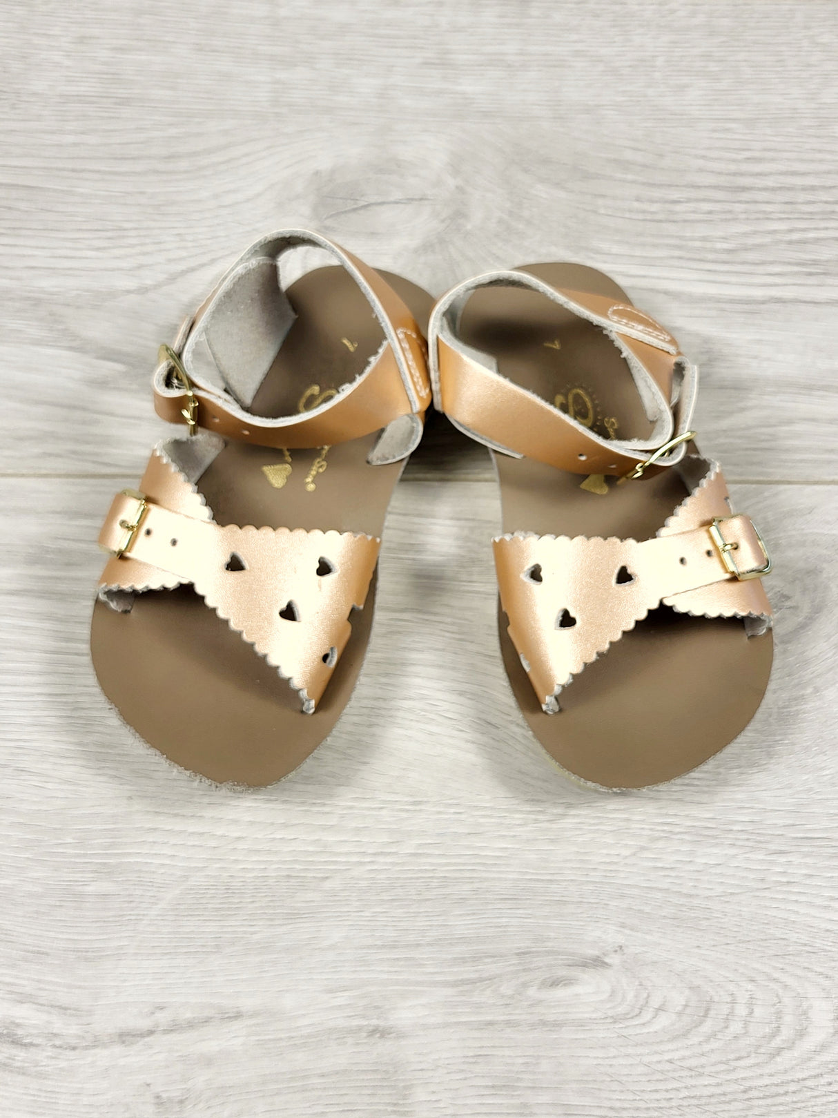 Rose gold saltwalter sandals. Size 7