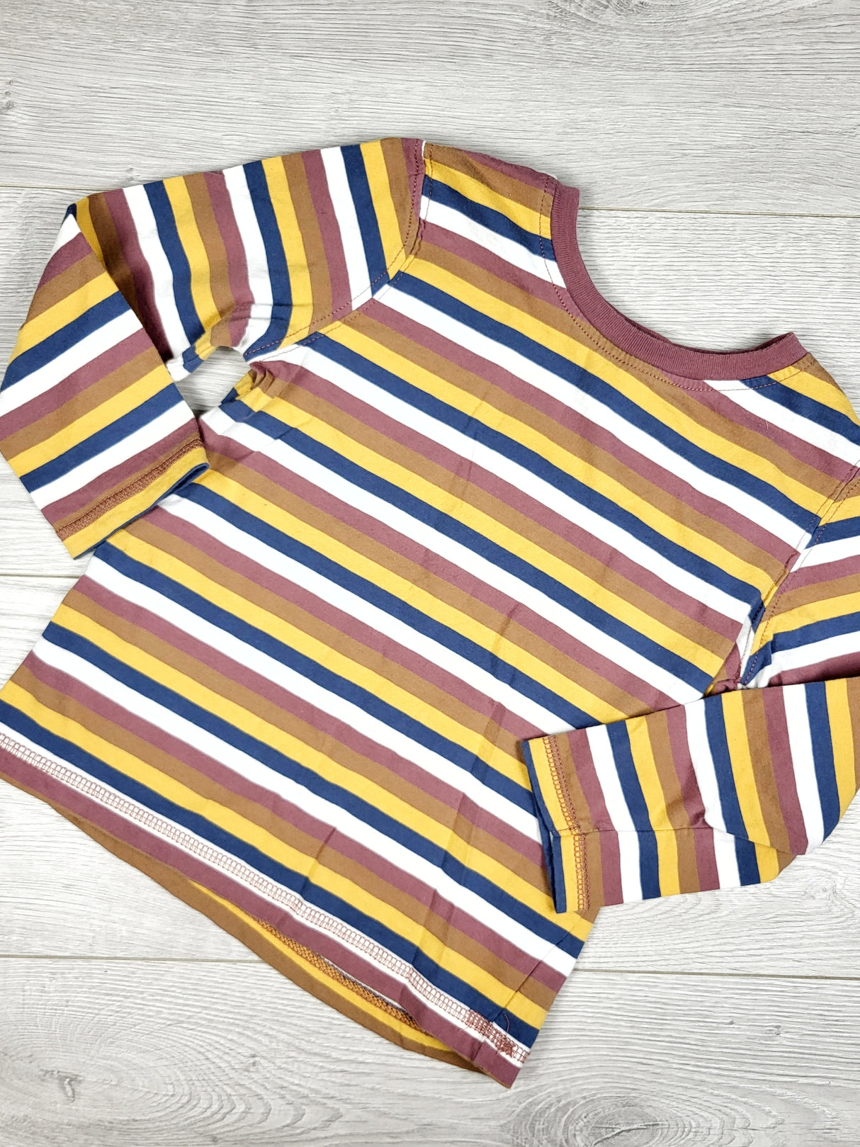 George multi-striped long sleeved top. Size 4T