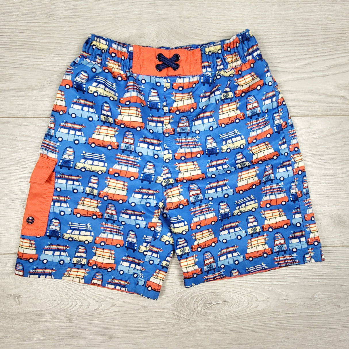 UV Skinz blue swim shorts with vans. Size 5T