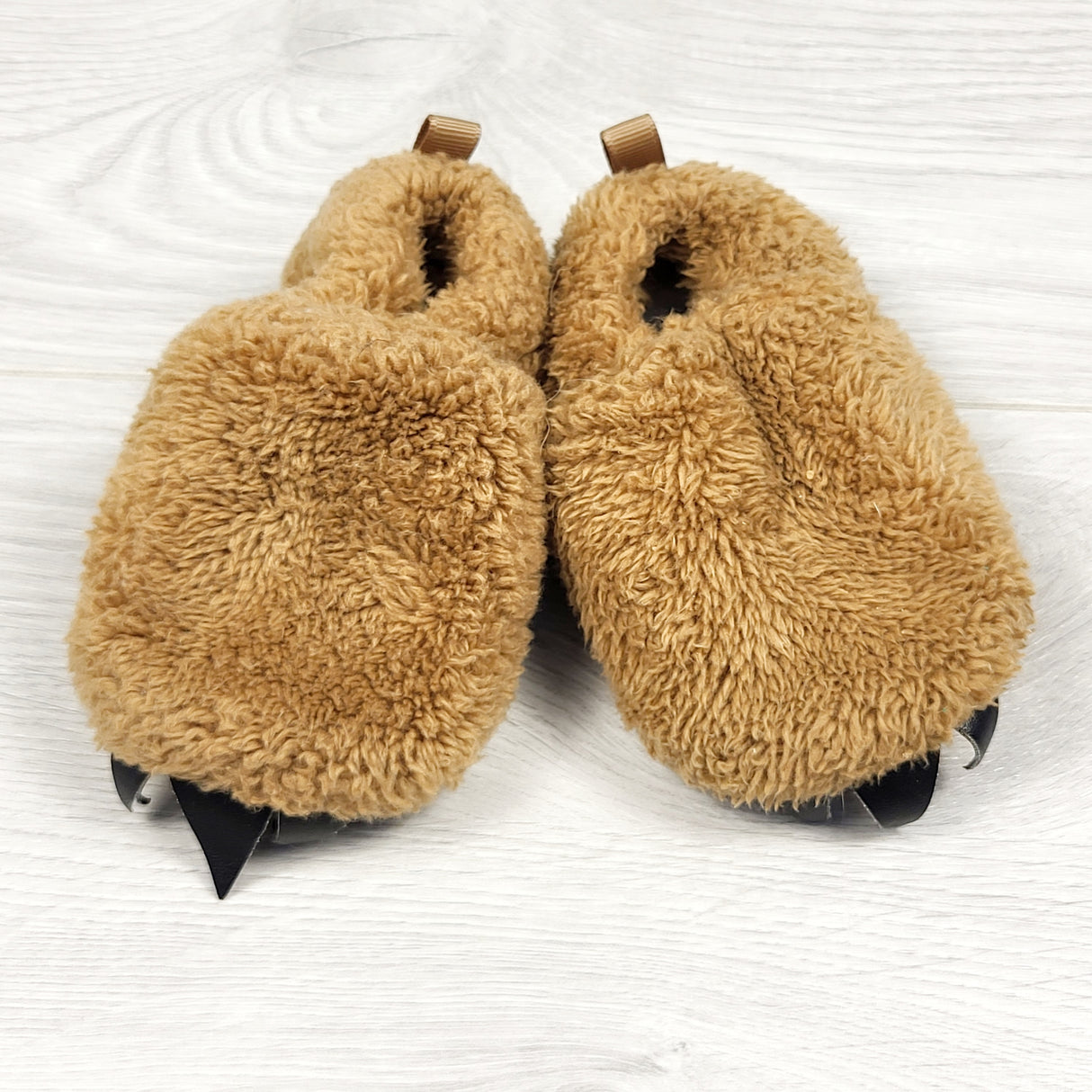 Rise Little Earthling brown fuzzy slippers. Size 12-18 months