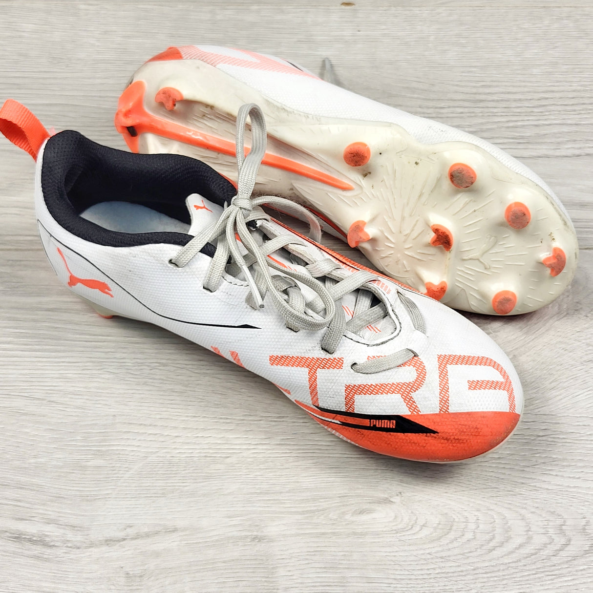 PUMA Ultra 5 Play FG/AG soccer cleats. Youth size 3