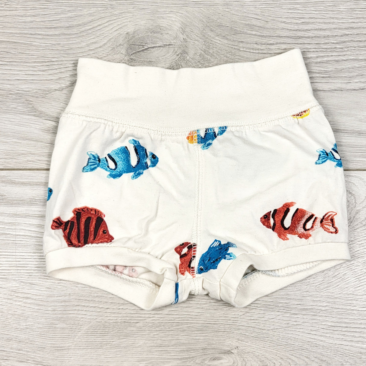 H and M white shorts with fish. Size 2-4 months